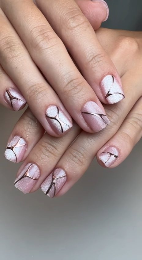 Short square nails in shimmering rose-pink cat-eye gel with fine rose-gold chrome lines at Paradisse Studio, Richmond Hill